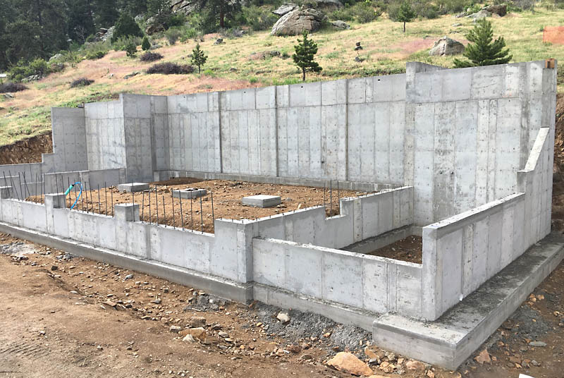 Here is a view of the new foundation walls one day after the forms were removed.