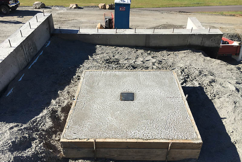 This footing for the NW corner of the front deck was poured at the same time as the slab because the fill in this area was only recently completed. <span class='myGreyFont'>[End of series.]</span>