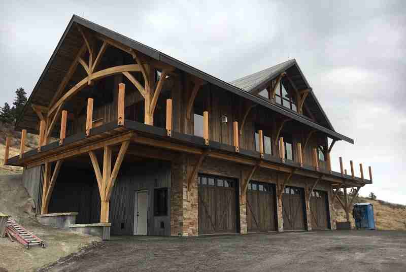 Here is a view of all four garage doors and the completed stone work.