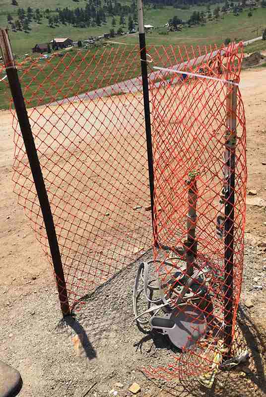 The well head is temporarily capped at the surface until the final grade is created in front of the garage. It will be inset below a well head manhole cover for access.