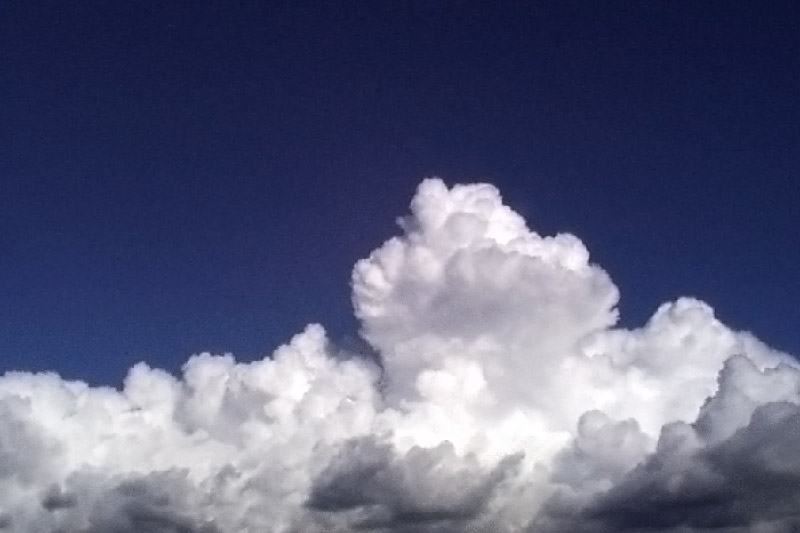 This is a cumulonimbus developing over the Chugach Mountains in Anchorage.