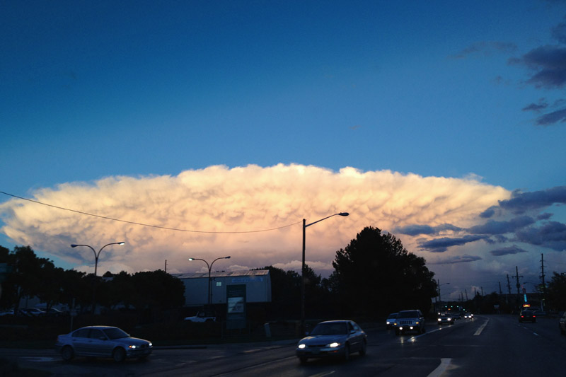 Cumulonimbus developing just east of Denver in a very interesting mushroom shape.