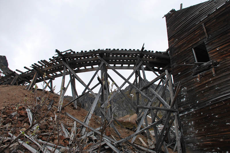 By 1938, this mine and the Alaska Free Gold Mine (on an adjacent mountain) were consolidated under the newly-formed Alaska-Pacific Consolidated Mining Company. They operated 83 claims over nearly 1,400 acres. In their busiest year — 1941 — they had over 200 employees and 22 families living on site.