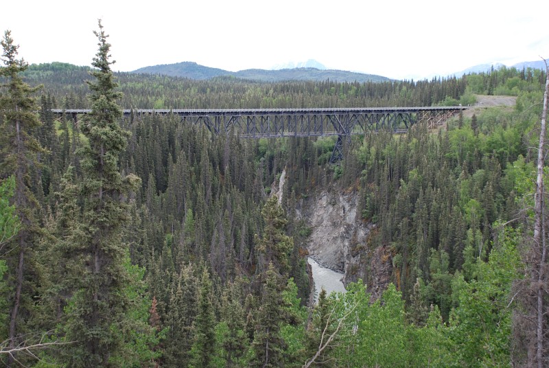 We're on the road to McCarthy now. This is the Kuskulana Bridge spanning 525 feet across and 238 feet above the Kuskulana River. It was orginally built in 1910 for the railroad: now it serves vehicles with a new deck and railing.