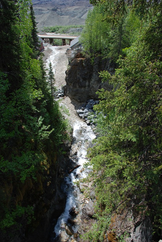 Here is a view from upstream of the Assay Office — the office is on the right just before the modern-day bridge. That bridge was recently rebuilt after being destroyed in a flood. <span class='myGreyFont'>[End of series. <a href='../index.html'>Return</a> to the Photos page.]</span>