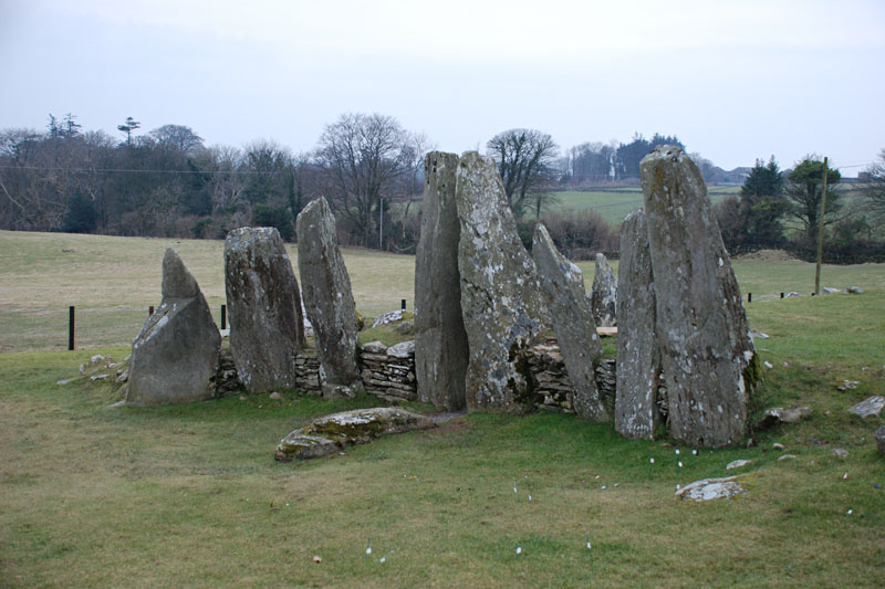 <h3>Cairnholy I & II</h3>Two central stones above ground form the entrance to an outer underground chamber. A second, inner chamber is sealed and inaccesible from the outer one. The outer chamber and the above-ground rocks are thought to be later additions.