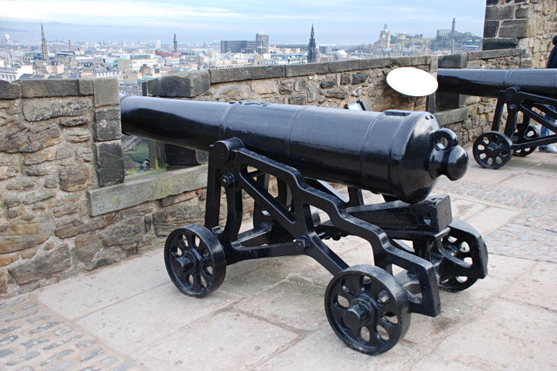 <h3>Edinburgh Castle</h3>This cannon overlooks present-day Edinburgh and sits on an addition to the castle called the "Half Moon Battery" built in 1578. The castle withstood its last siege in 1745 when Bonny Prince Charlie was defeated by the castle's defenses. Many prisoners of war were held in the castle, including those from the Seven Years War, the War of American Independence, the French Revolutionary Wars and Napoleonic Wars.