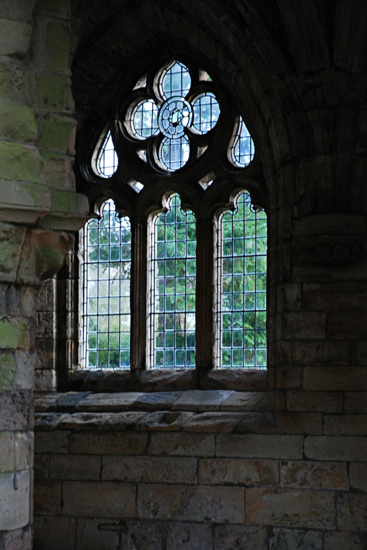 <h3>Jedburgh Abbey</h3>This restored glass shows the beauty of the windows.