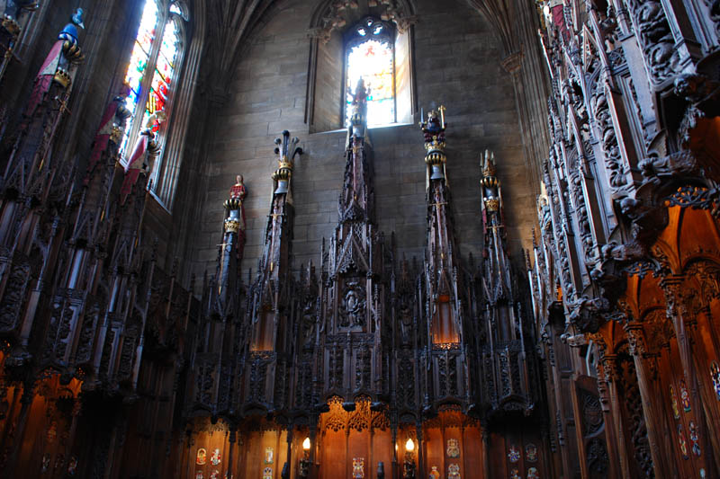 <h3>St. Giles Cathedral</h3>The Order of the Thistle was founded in 1687 by King James VII of Scotland. The order has a chapel within St. Giles, built in 1911. This picture shows some of the ornate wood work above each of 16 knight's seats within the chapel.