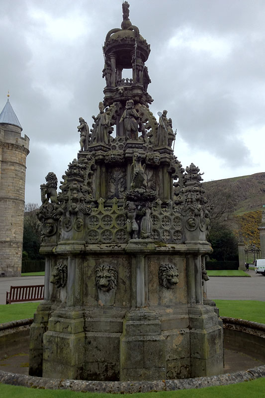 The fountain in front of the palace includes many different symbols of Scotland and a crown on top.