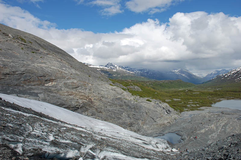 We're looking back towards the foot of the glacier. The far rock outcropping has been sculpted by the glacier. This glacier is retreating, but very slowly with over 250 inches of snow here every year.