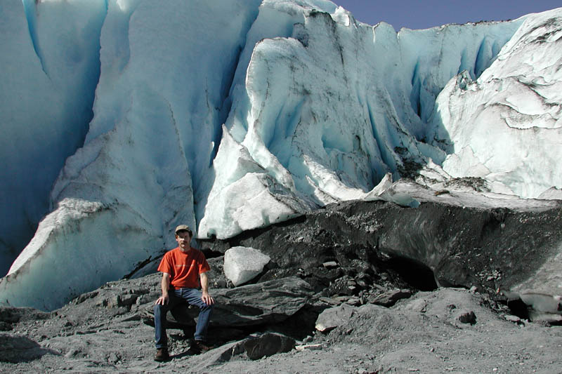 Here I am sitting on a boulder that's sitting on the ice.