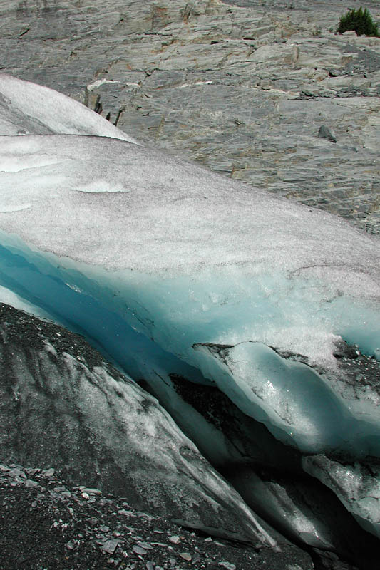 The ice looks blue because it  absorbs most of the red spectrum and reflects back the blue wavelengths. <span class='myGreyFont'>[End of series. <a href='../index.html'>Return</a> to the Photos page.]</span>