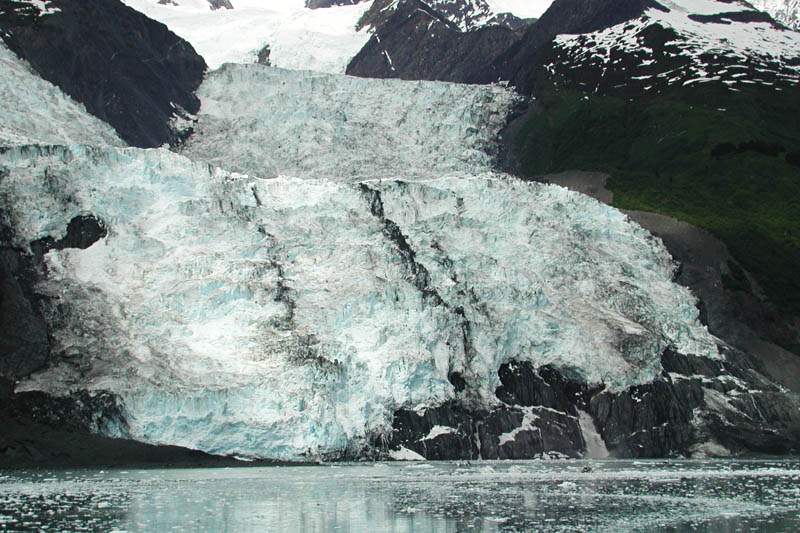 When ice falls off the face of the glacier, it is called calving.